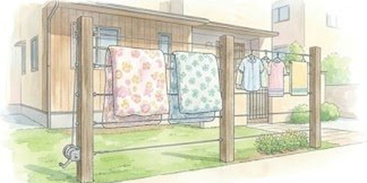 ワイヤー物干しで布団・洗濯物を干している使用シーン